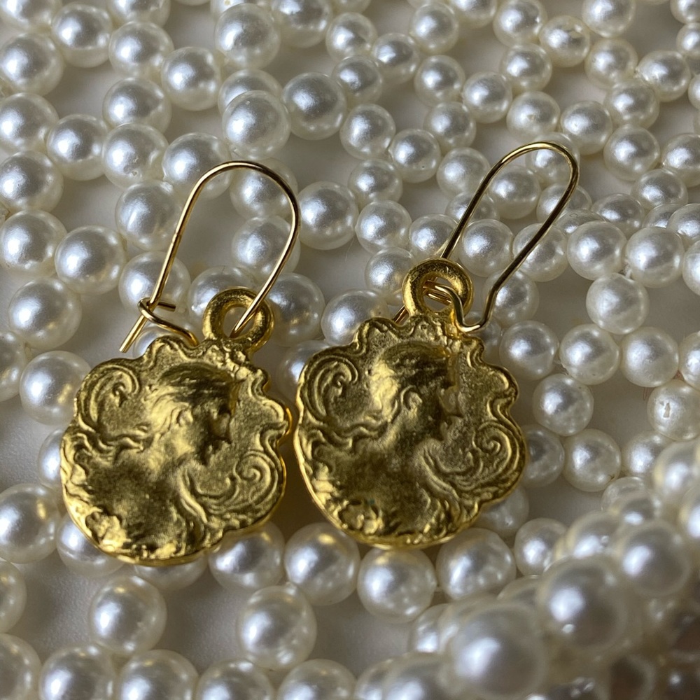 Golden cameo face earrings